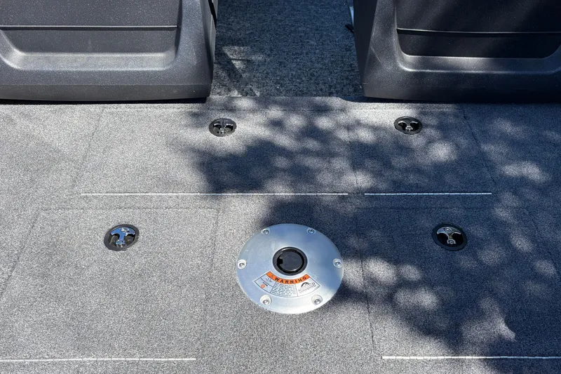 Slide: The Image of Carpeted deck of 2026 Tracker Pro Guide V-16 WT boat with seat mounts. - 36