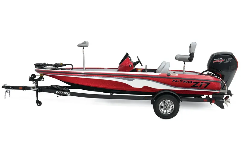 Slide: The Image of 2026 Nitro Z17 fishing boat on trailer, parked outdoors. - 2
