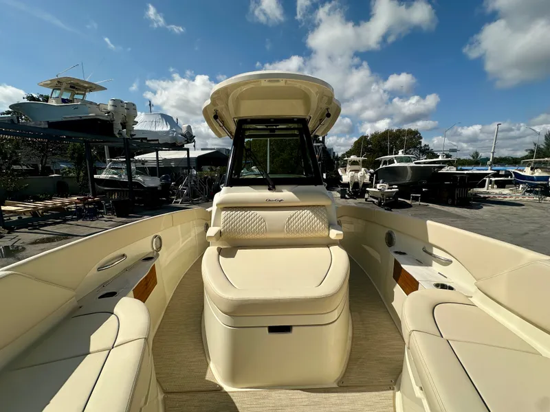 Slide: The Image of 2026 Chris-Craft Catalina 28 boat docked under sunny skies. - 10