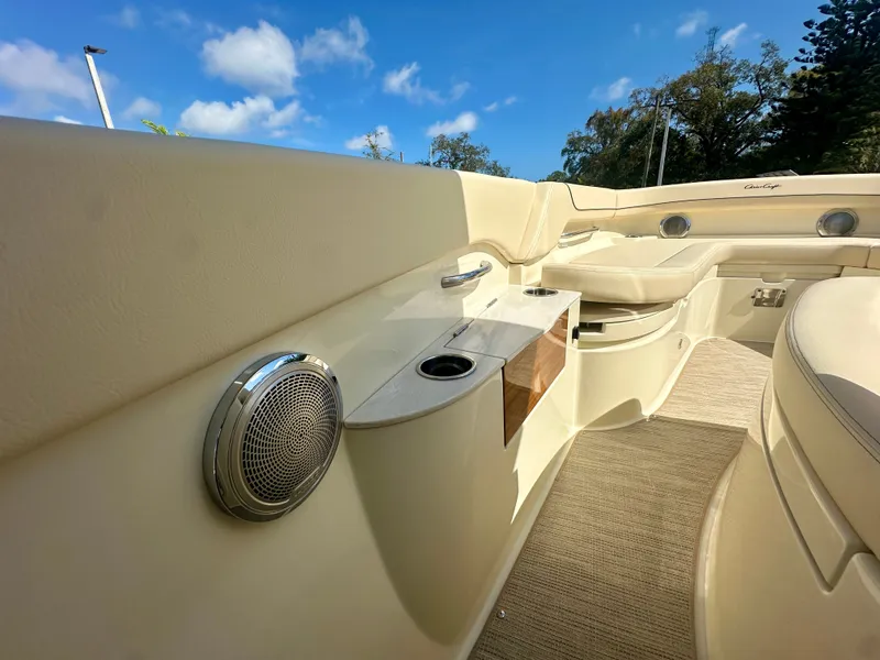 Slide: The Image of Interior of 2026 Chris-Craft Catalina 28 with luxurious seating and speaker. - 12