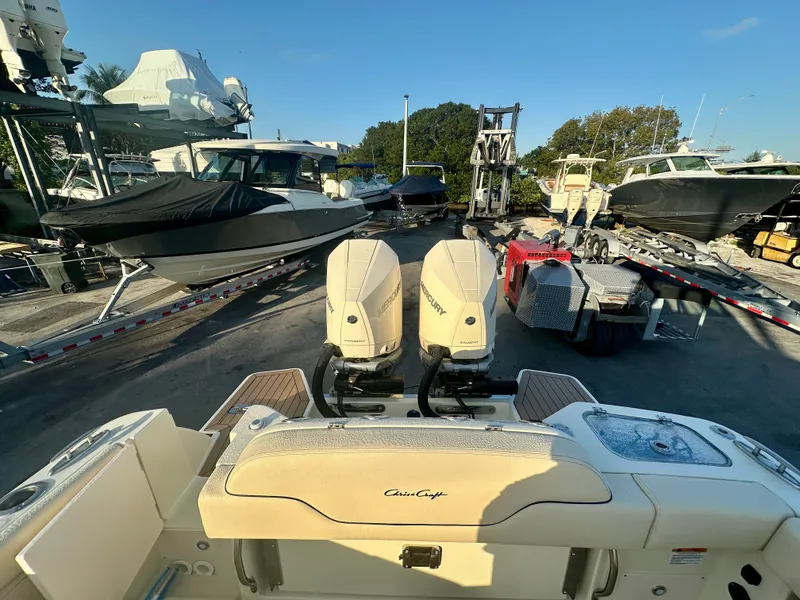 Slide: The Image of Chris-Craft Catalina 28 boat, 2026 model, on a boat trailer. - 13