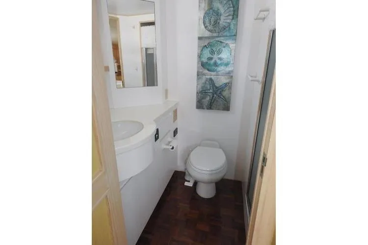 Slide: The Image of Bathroom interior of 1998 Ocean Alexander Yachtfish Command Bridge with modern decor. - 13