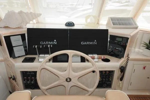 Slide: The Image of 1998 Ocean Alexander Yachtfish Command Bridge helm with Garmin navigation systems. - 21