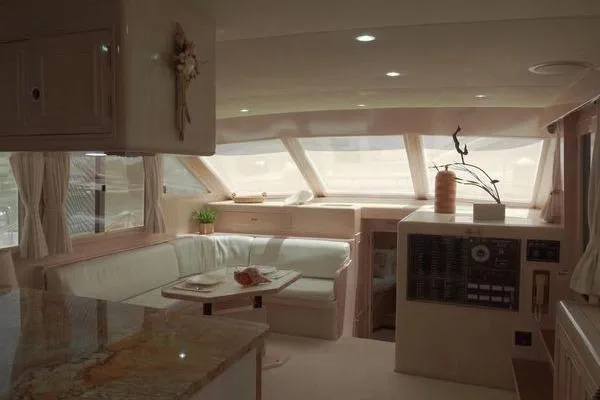 Slide: The Image of Luxurious interior of 1998 Ocean Alexander Yachtfish Command Bridge with elegant seating and decor. - 8
