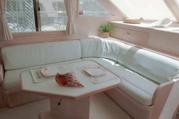 Slide: The Image of Luxurious 1998 Ocean Alexander Yachtfish Command Bridge interior with elegant seating and decor. - 9
