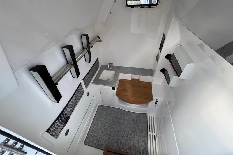 Slide: The Image of Interior view of 2021 Everglades 335 Center Console boat with advanced navigation system. - 20