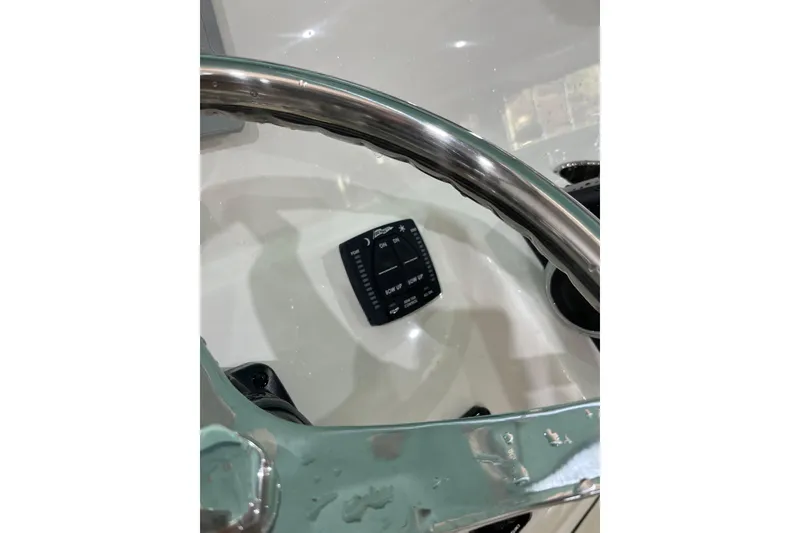 Slide: The Image of Steering wheel and control panel of 2026 Pioneer 202 Islander boat. - 10