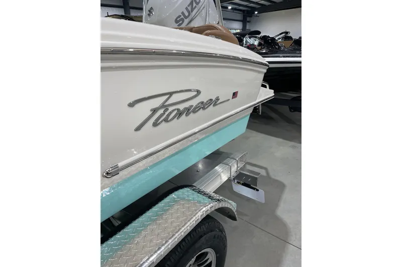 Slide: The Image of 2026 Pioneer 202 Islander boat on trailer in showroom. - 5