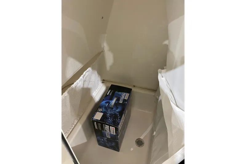 Slide: The Image of Storage compartment in 2026 Pioneer 202 Islander boat with a propeller box inside. - 7