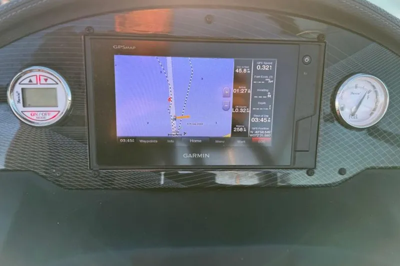 Slide: The Image of Dashboard of a 2018 Regal 21 OBX with Garmin GPS display. - 15