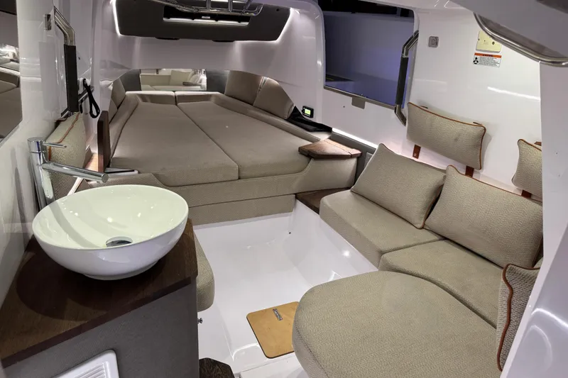 Slide: The Image of Luxurious interior of 2021 Axopar 37 boat with modern seating and sleek design. - 14