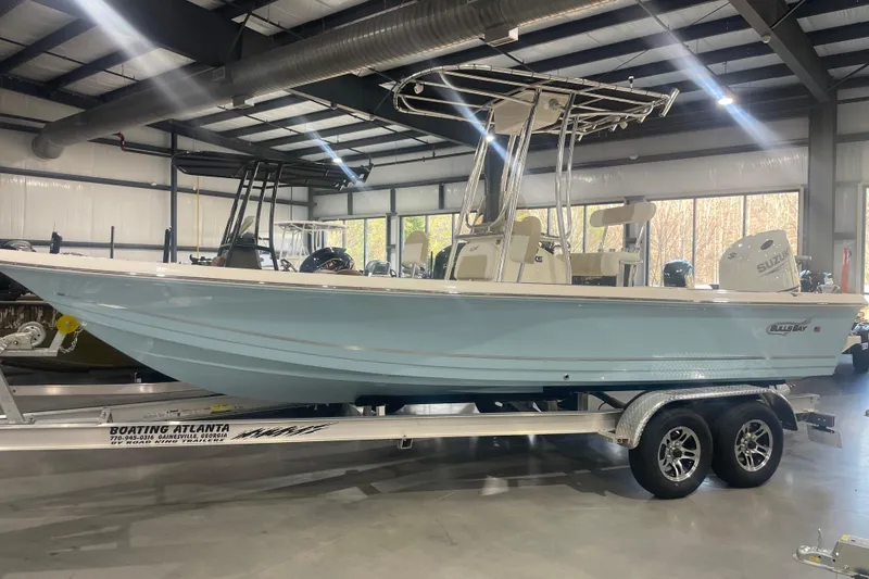 The Image of 2026 Bulls Bay 2200 XS boat on trailer in indoor showroom. - 0