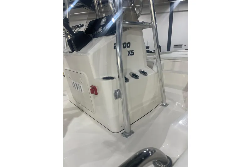 Slide: The Image of 2026 Bulls Bay 2200 XS boat console with steering and controls in a showroom. - 13