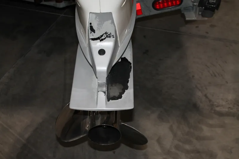 Slide: The Image of Damaged propeller of 2017 Boston Whaler 330 Outrage boat on trailer. - 11