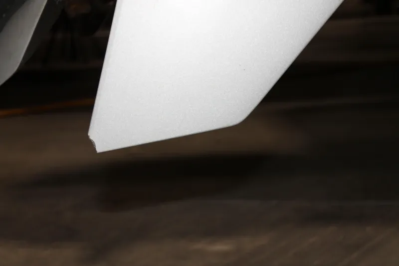 Slide: The Image of Close-up of a 2017 Boston Whaler 330 Outrage boat's hull detail. - 15