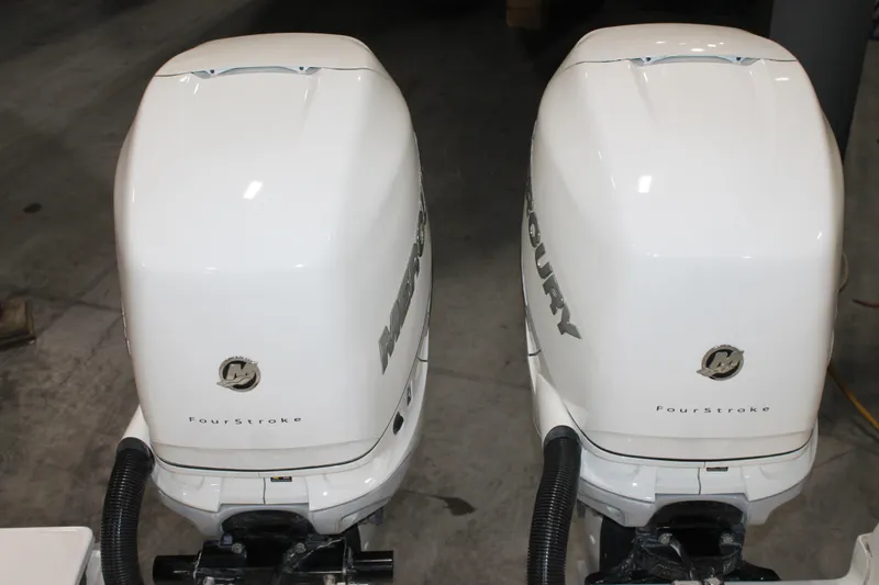 Slide: The Image of Twin Mercury FourStroke outboard engines on a 2017 Boston Whaler 330 Outrage boat. - 17