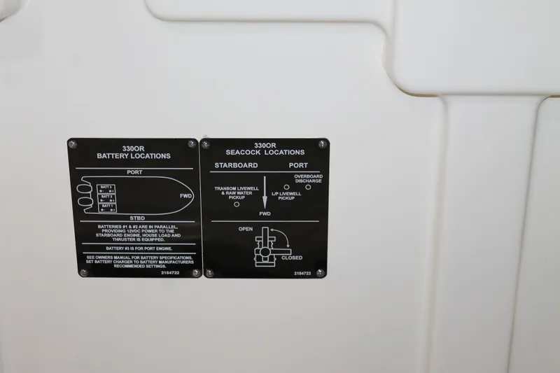 Slide: The Image of 2017 Boston Whaler 330 Outrage battery and seacock location diagram on boat panel. - 34
