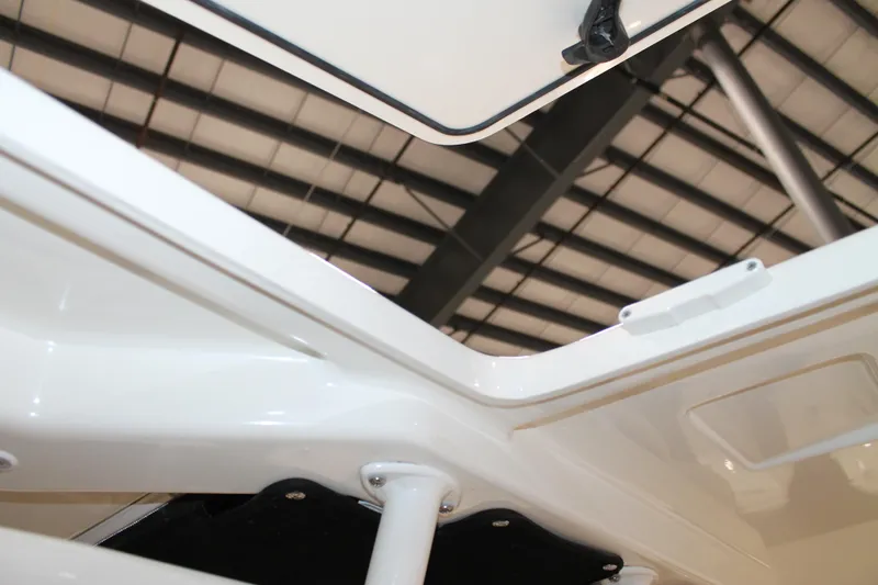 Slide: The Image of 2017 Boston Whaler 330 Outrage interior detail, showcasing sleek design and craftsmanship. - 55