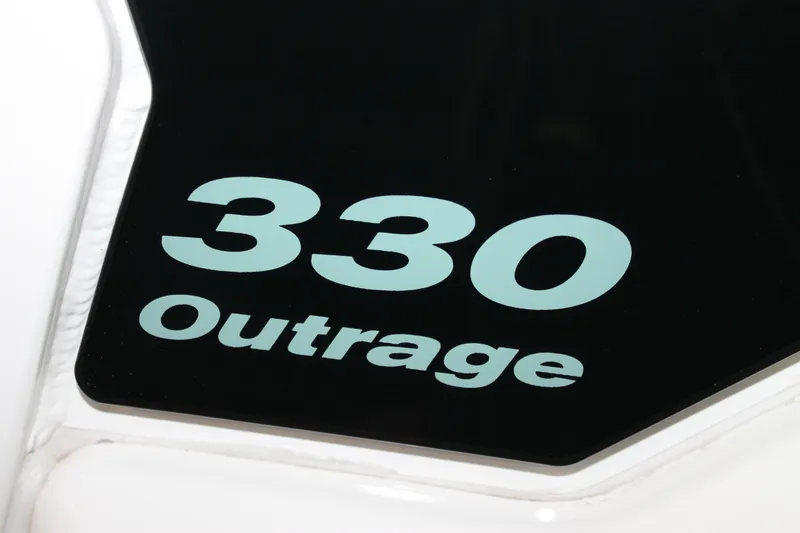 Slide: The Image of Close-up of 2017 Boston Whaler 330 Outrage model nameplate. - 59