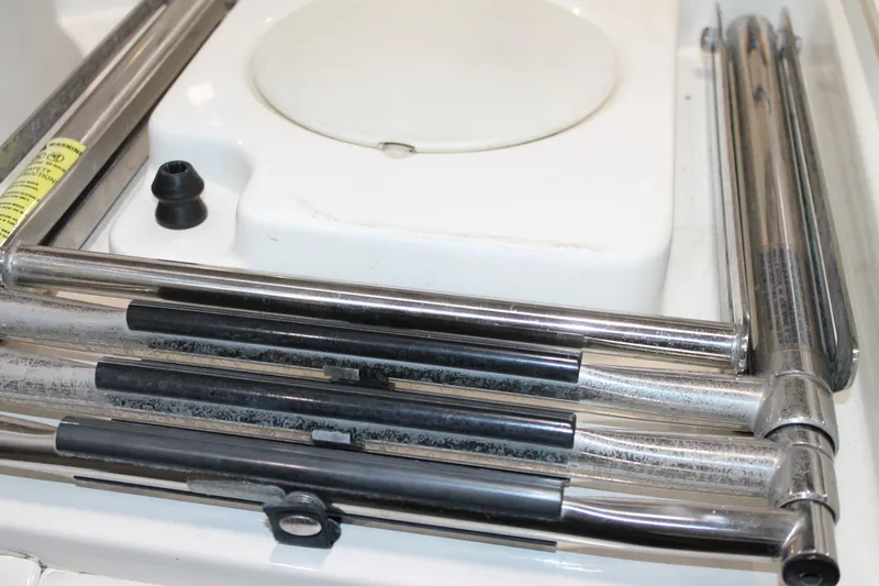 Slide: The Image of Close-up of 2017 Boston Whaler 330 Outrage boat's stainless steel fittings and components. - 6