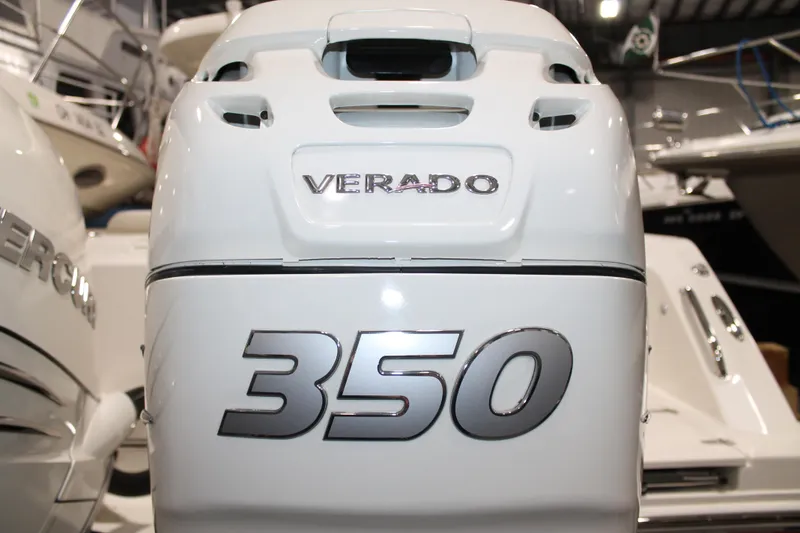 Slide: The Image of Boston Whaler 330 Outrage 2017 with Verado 350 engine in showroom. - 8
