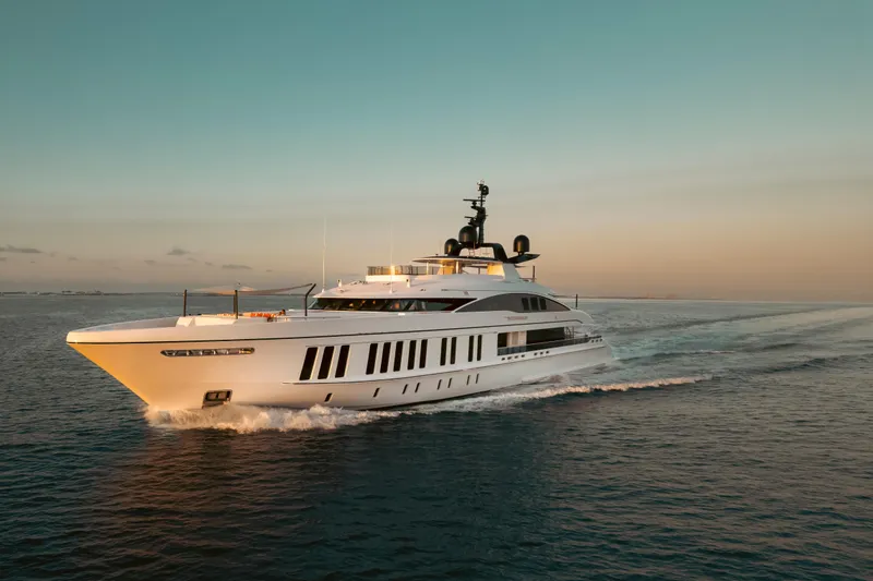 The Image of Luxurious 2016 Alia Yachts 60M cruising at sunset on open water. - 0