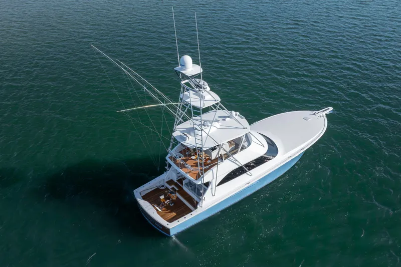 Slide: The Image of 2009 Viking 60 Convertible yacht on open water, aerial view. - 10