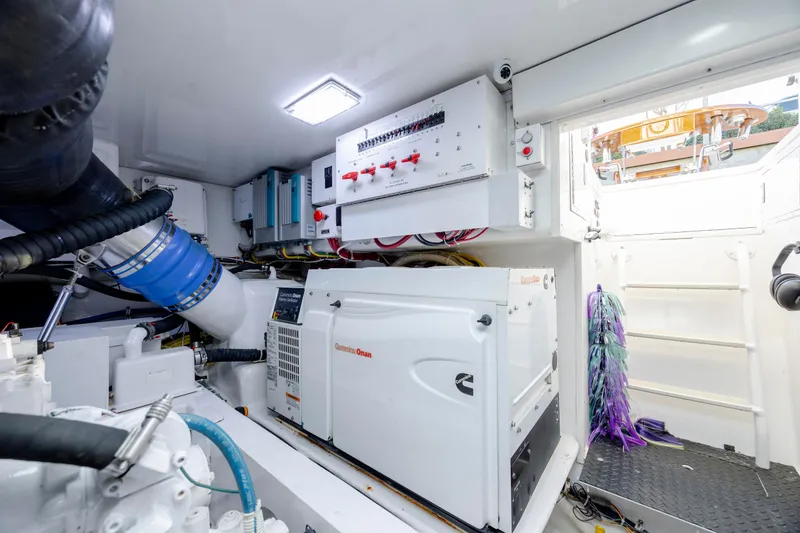 Slide: The Image of Engine room of 2009 Viking 60 Convertible yacht with Cummins Onan generator. - 102