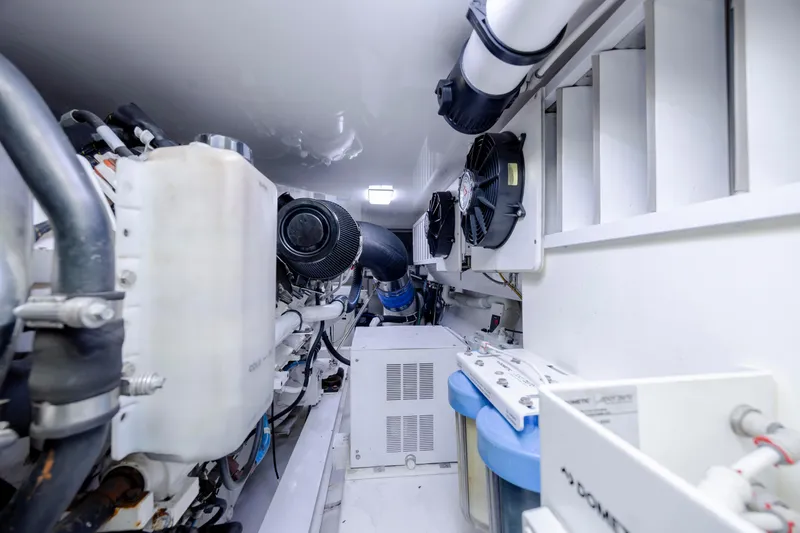 Slide: The Image of Engine room of 2009 Viking 60 Convertible yacht, showcasing machinery and components. - 109