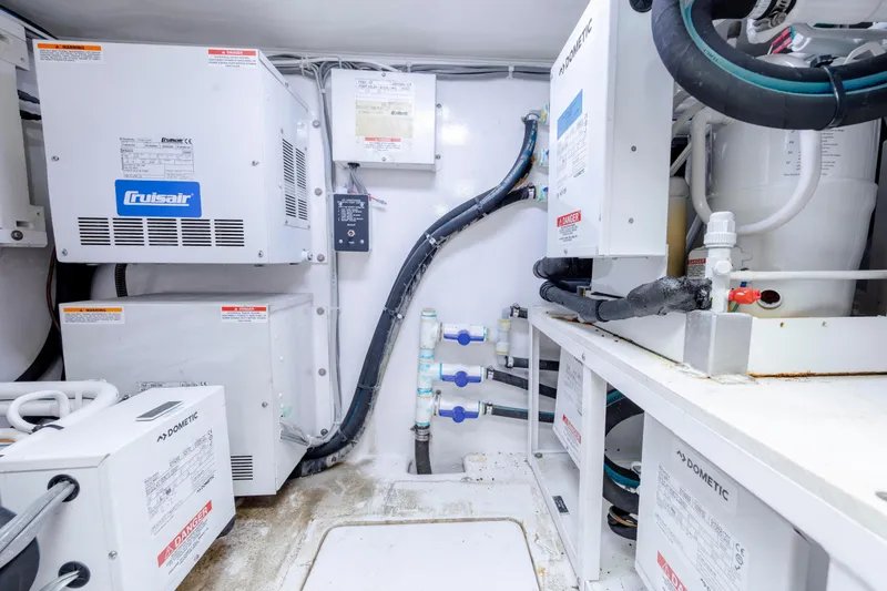 Slide: The Image of Engine room of 2009 Viking 60 Convertible yacht with Cruisair and Dometic systems. - 112