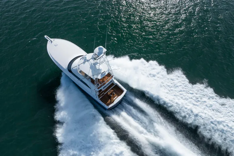 Slide: The Image of Aerial view of 2009 Viking 60 Convertible yacht cruising on open water. - 25