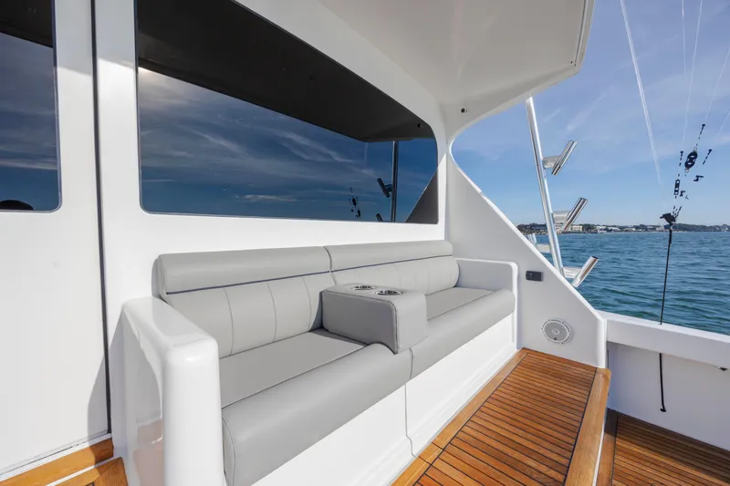 Slide: The Image of Luxurious seating area on 2009 Viking 60 Convertible yacht with ocean view. - 32