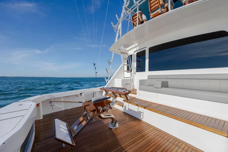 Slide: The Image of 2009 Viking 60 Convertible yacht deck with fishing chair and ocean view. - 34