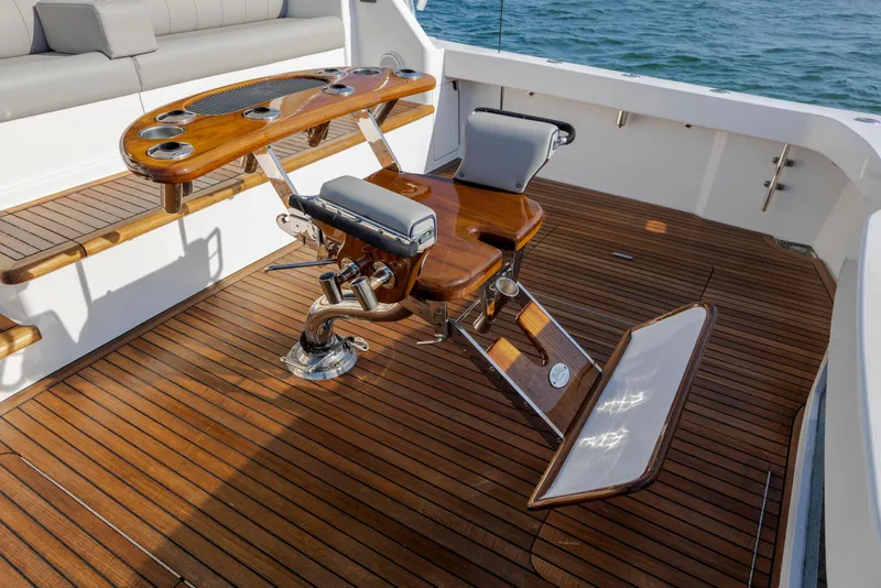 Slide: The Image of Luxurious 2009 Viking 60 Convertible yacht deck with fishing chair and teak flooring. - 35