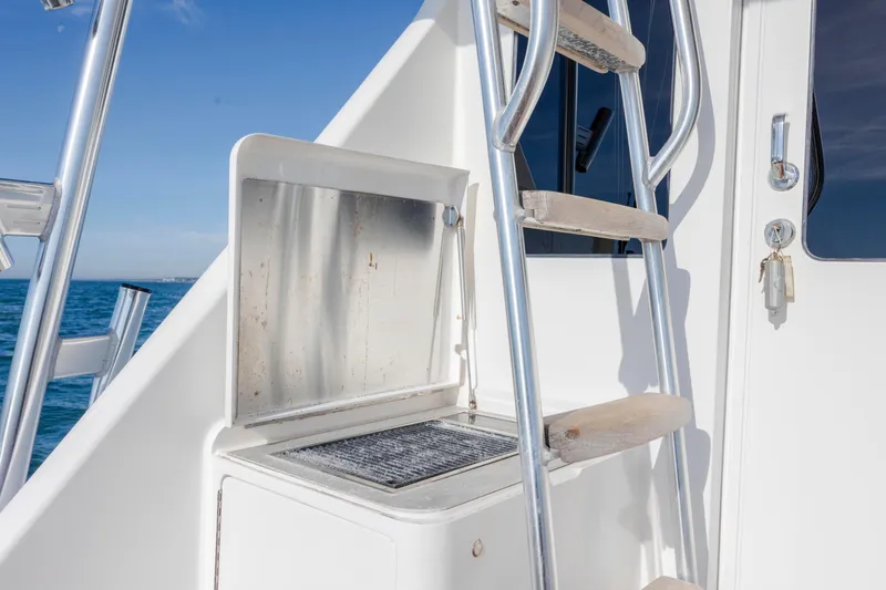 Slide: The Image of Stainless steel ladder and grill on 2009 Viking 60 Convertible yacht deck. - 39