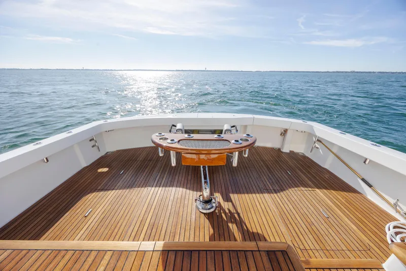 Slide: The Image of 2009 Viking 60 Convertible yacht deck with ocean view and fishing station. - 44