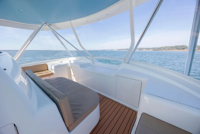 Slide: The Image of 2009 Viking 60 Convertible yacht interior with ocean view and comfortable seating. - 56