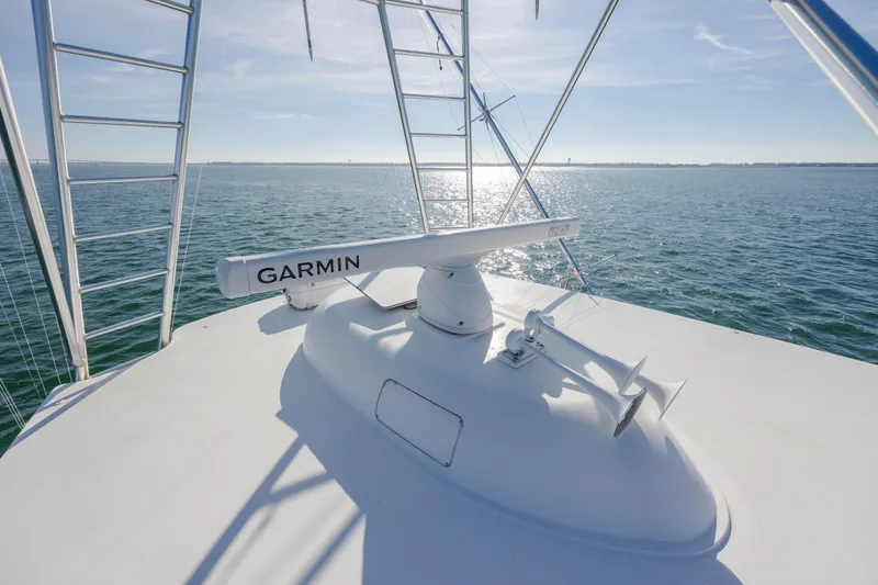 Slide: The Image of Rooftop view of 2009 Viking 60 Convertible yacht with Garmin radar over ocean. - 62