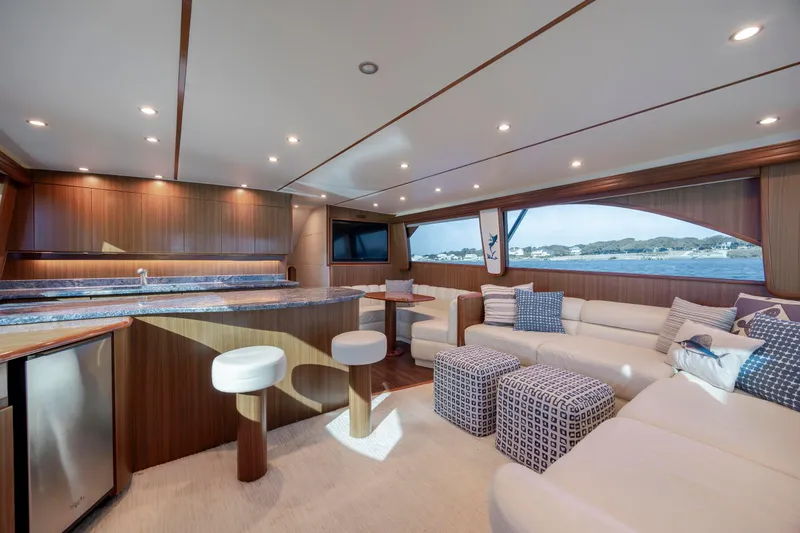 Slide: The Image of Luxurious interior of 2009 Viking 60 Convertible yacht with modern furnishings and ocean view. - 64