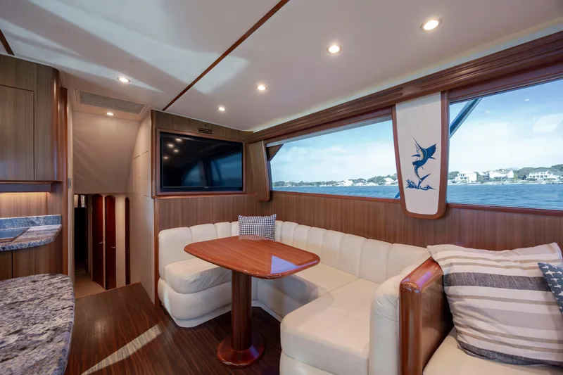 Slide: The Image of Luxurious interior of 2009 Viking 60 Convertible yacht with elegant seating and ocean view. - 68