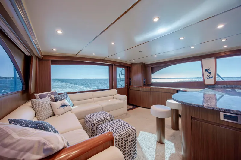 Slide: The Image of Luxurious interior of 2009 Viking 60 Convertible yacht with ocean view and elegant seating. - 71