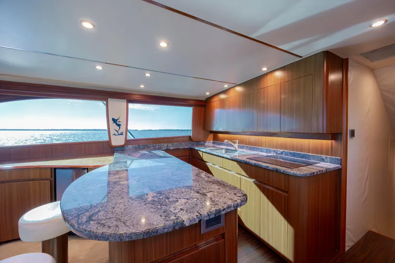 Slide: The Image of Luxurious kitchen interior of 2009 Viking 60 Convertible yacht with ocean view. - 72