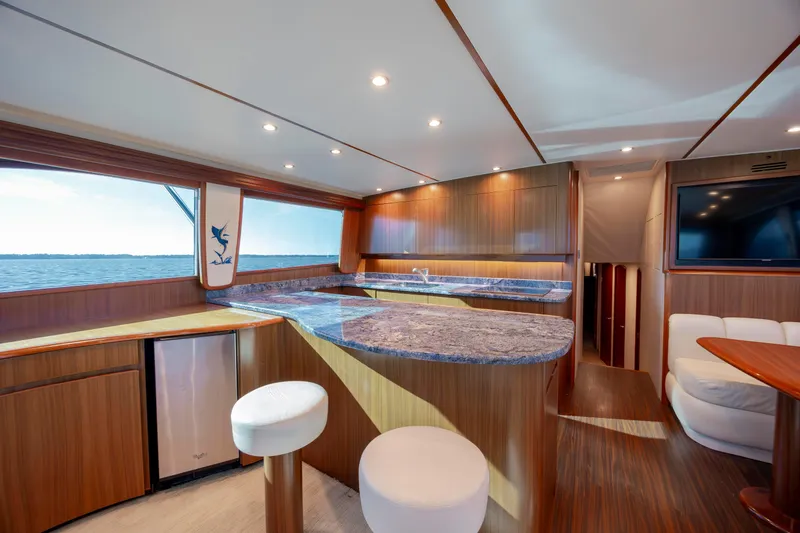 Slide: The Image of Luxurious interior of 2009 Viking 60 Convertible yacht with modern kitchen and ocean view. - 79