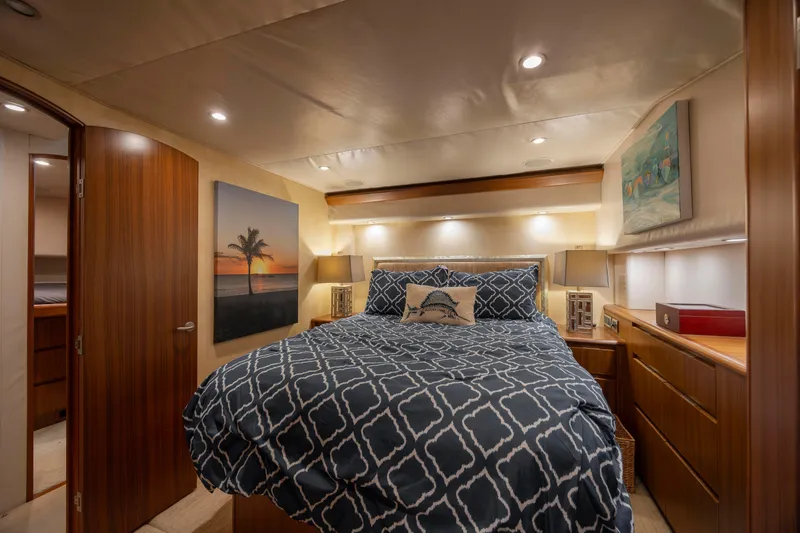 Slide: The Image of Luxurious bedroom interior of 2009 Viking 60 Convertible yacht with elegant decor and lighting. - 85