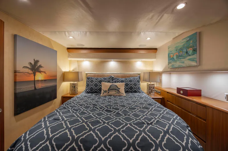 Slide: The Image of Luxurious bedroom interior of 2009 Viking 60 Convertible yacht with elegant decor and artwork. - 86