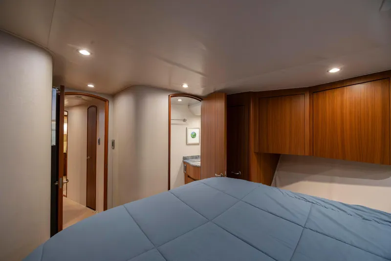 Slide: The Image of Luxurious cabin interior of 2009 Viking 60 Convertible yacht with wood cabinetry. - 97