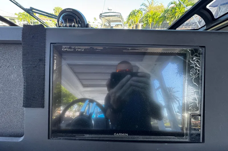 Slide: The Image of Garmin GPSMAP 7412 on 2017 Axopar 37 Sun Top boat dashboard. - 22