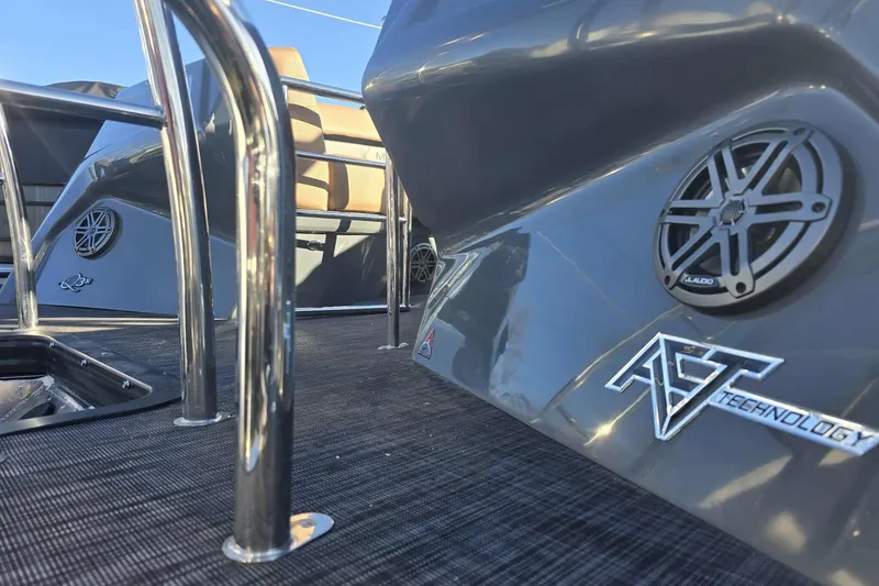 Slide: The Image of 2026 Qwest 8524 Q3XA boat with sleek design and advanced audio technology. - 4