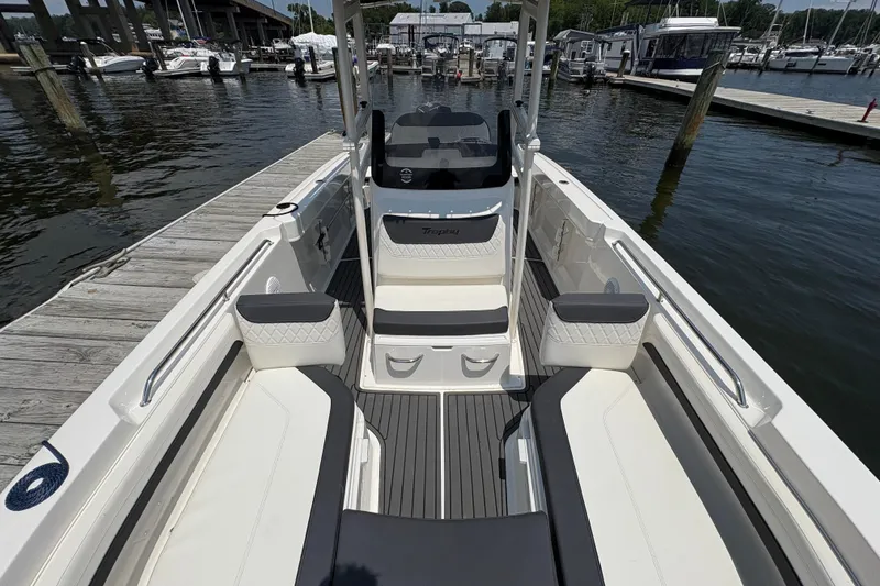 Slide: The Image of 2024 Trophy CC22 boat interior at dock, featuring sleek seating and modern design. - 4