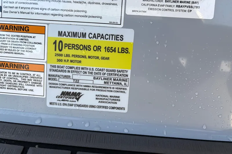 Slide: The Image of Boat capacity label for Trophy CC22, 2024 model, showing maximum 10 persons or 1654 lbs. - 7